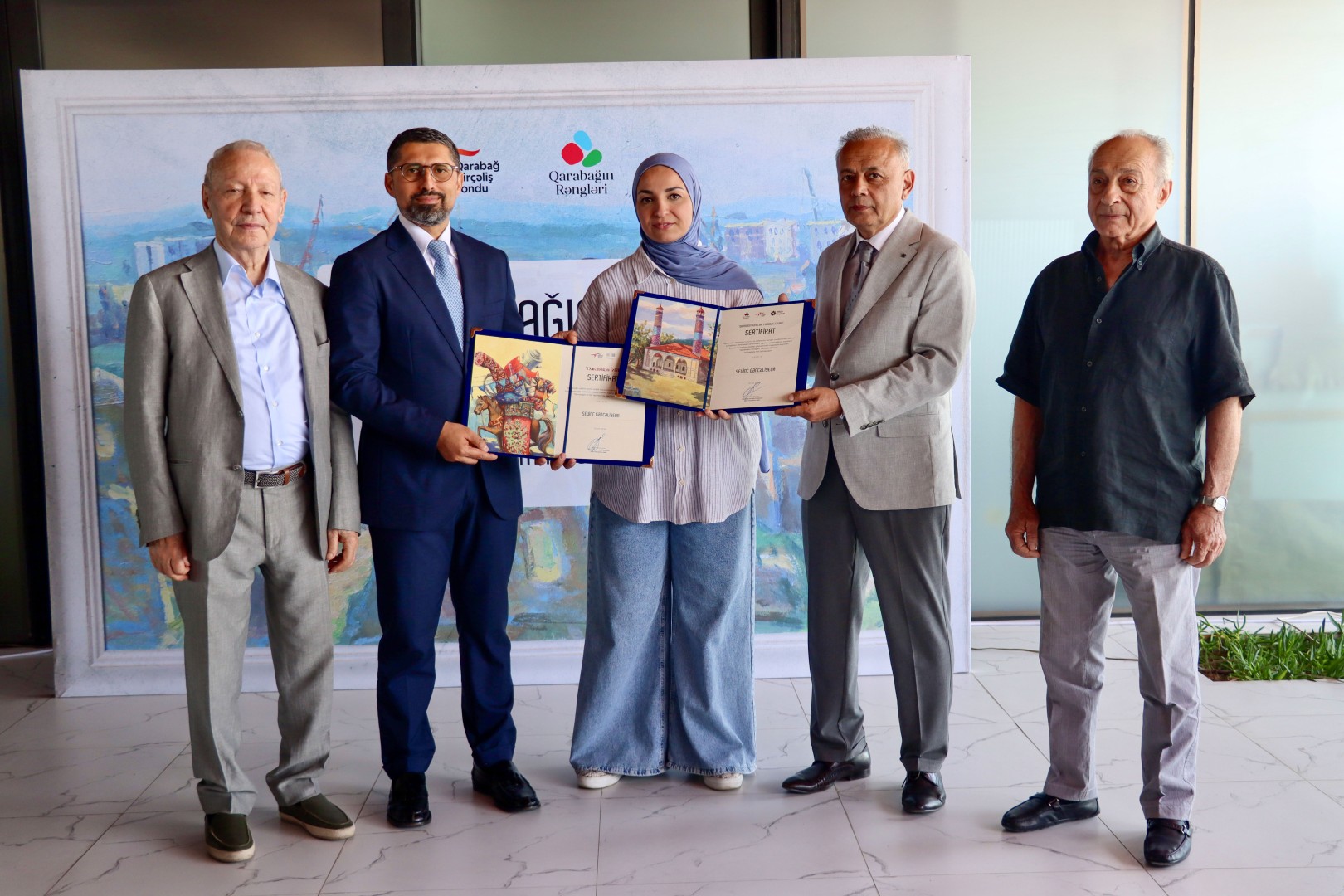 QDF “Qarabağın Rəngləri” (2026) layihəsində iştirak edən gənc rəssamları mükafatlandırdı