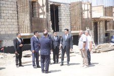 Xaçmaz rayonunun Yeni Həyat qəsəbəsində qəzalı binanın yerində yeni yaşayış binası inşa olunur (FOTO)